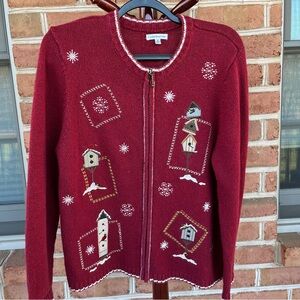Cranberry red and white zip up cardigan sweater with birdhouses. Medium